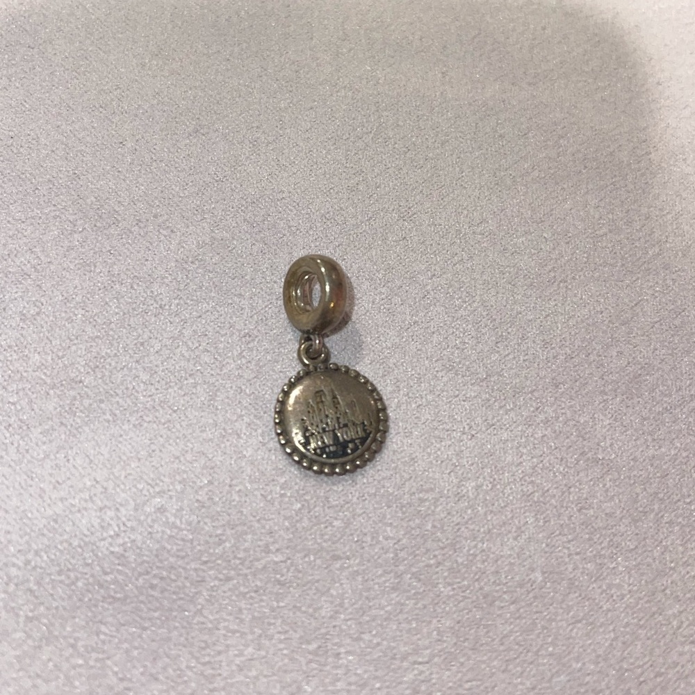 Pandora “New York” charm. From New York